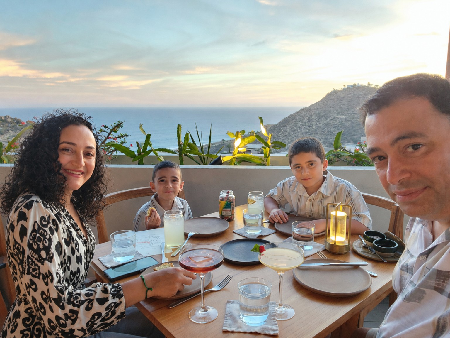 Kourosh Ahmadian with his wife, Dr. Forouzandeh Alavi, and their sons Parsa and Pasha